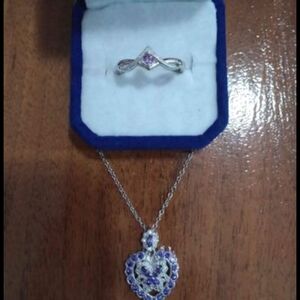 Source Unknown Silver and Purple Rings Collection